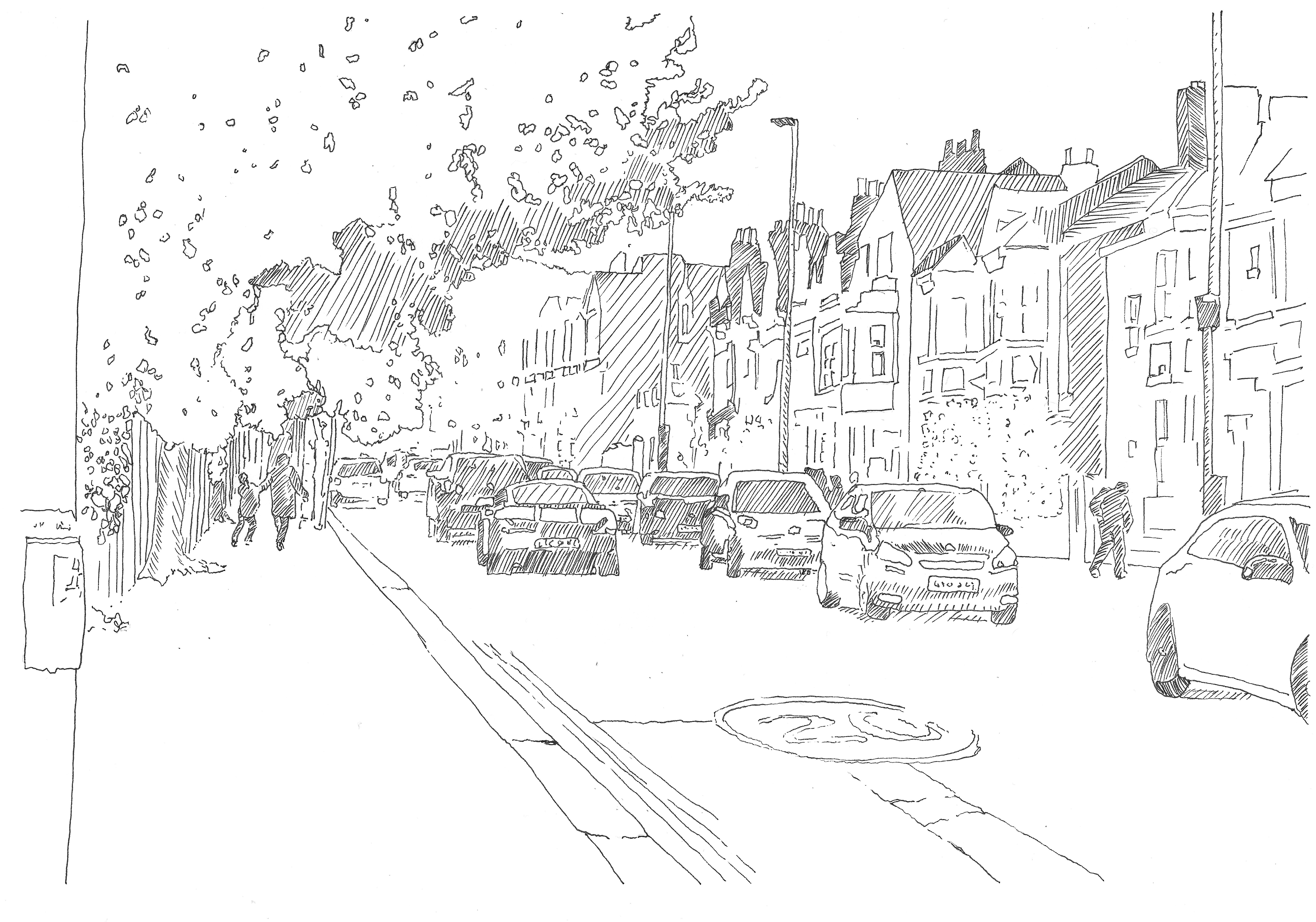 View of a street lined with houses and large numbers of cars travelling in each direction