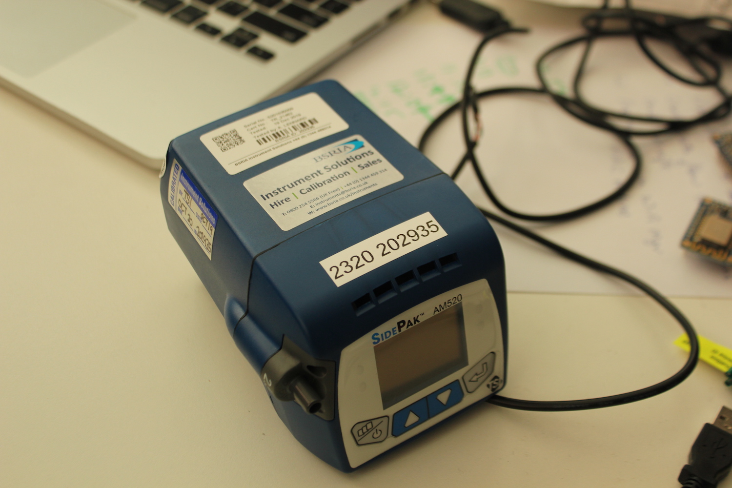 Sidepak reference monitor being set up on a desk