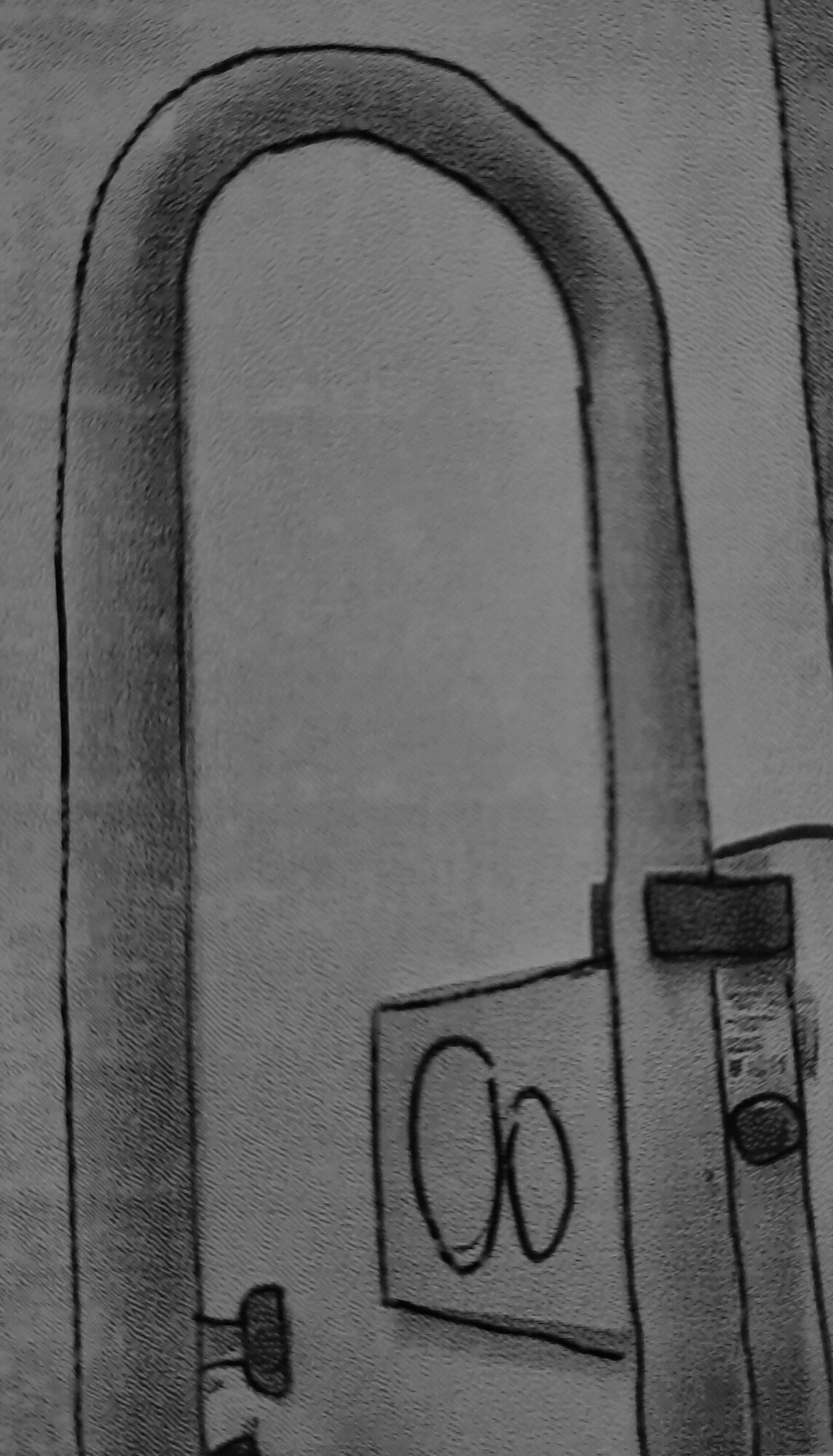 An arm rest made from tube metal, folded upwards